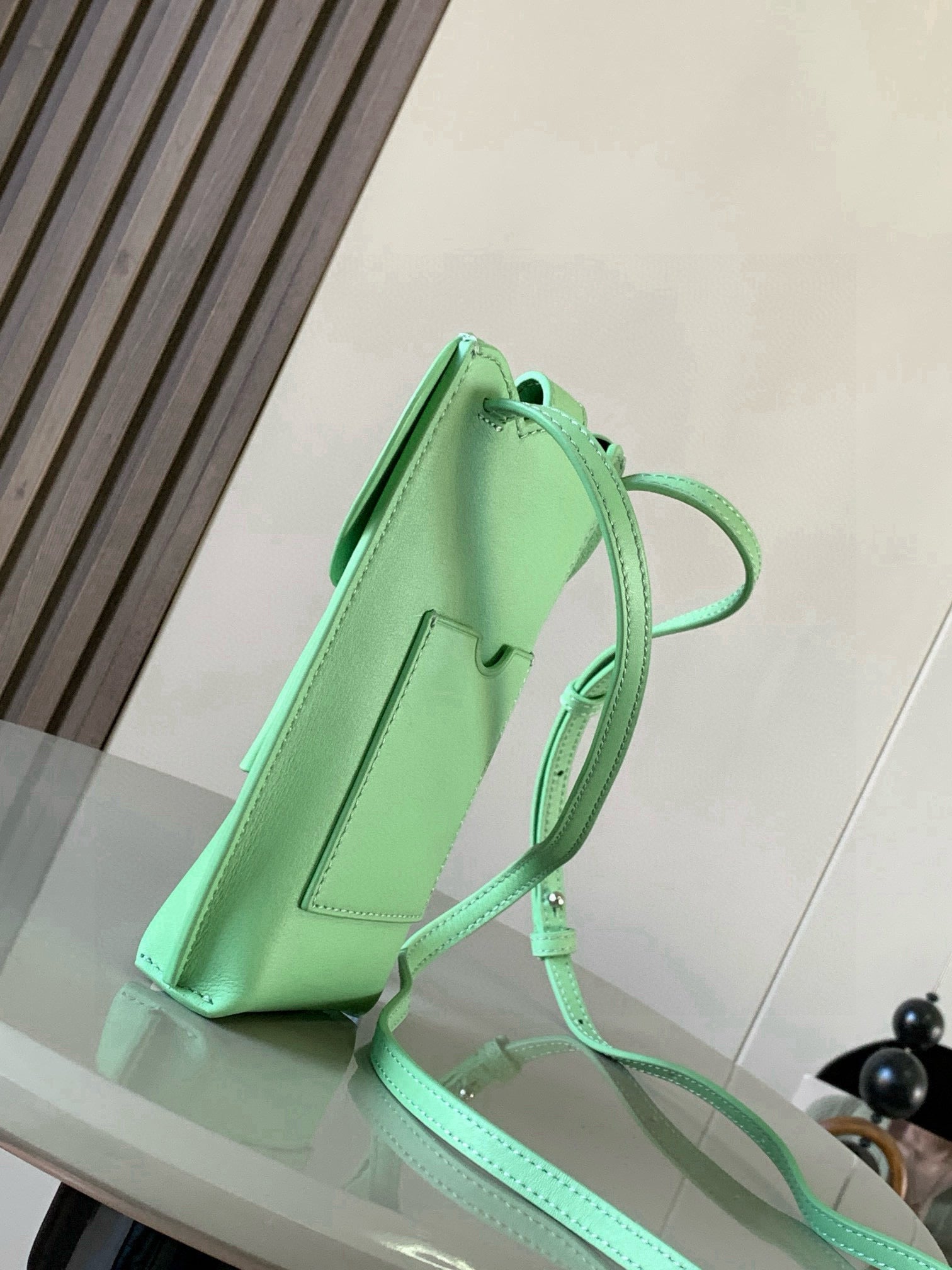 Loewe mint green leather mini bag, adjustable crossbody strap and top-handle loop