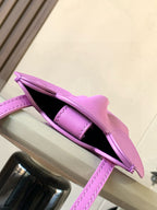 Loewe bag lilac leather with open top showing dark interior and front strap