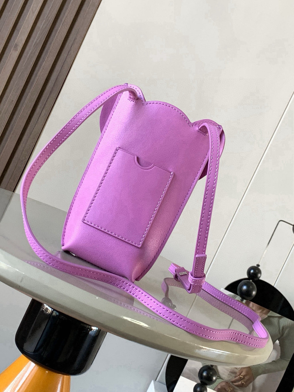 Loewe bag in lilac leather with long crossbody strap and scalloped top flap