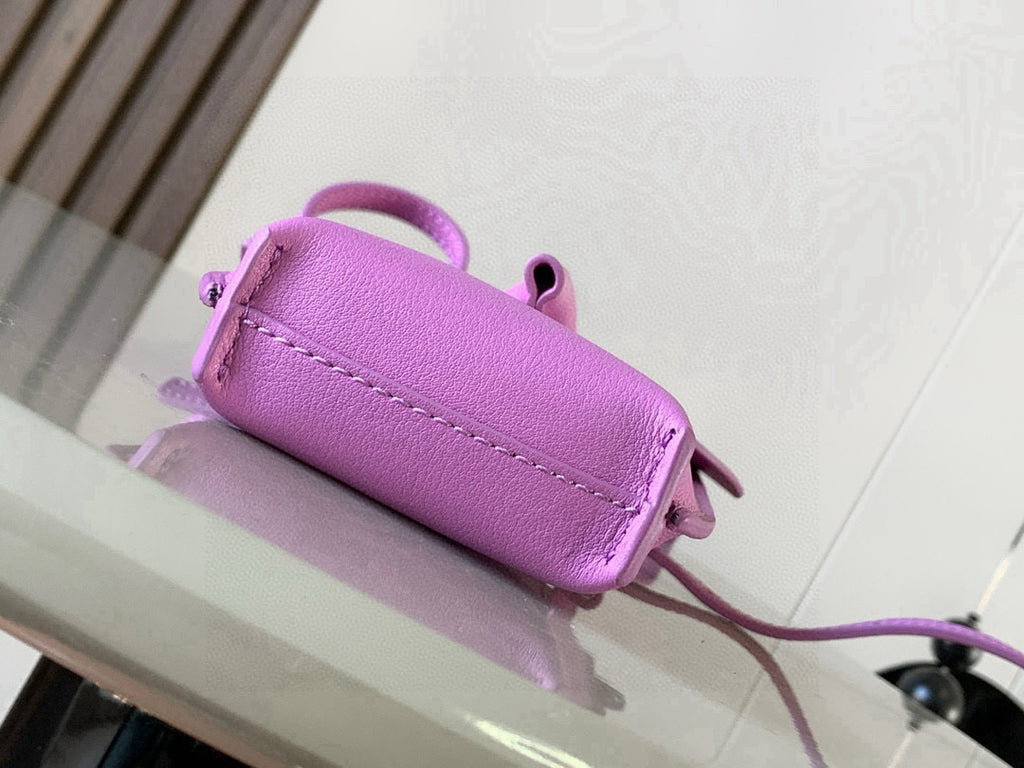 Loewe bag lilac leather with snap button flap and side strap loops
