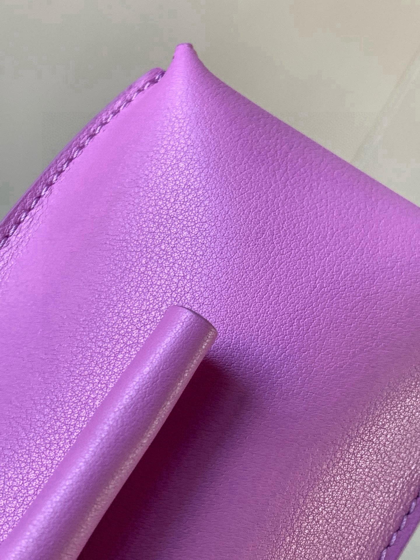 Loewe bag lilac leather top handle attachment and textured surface
