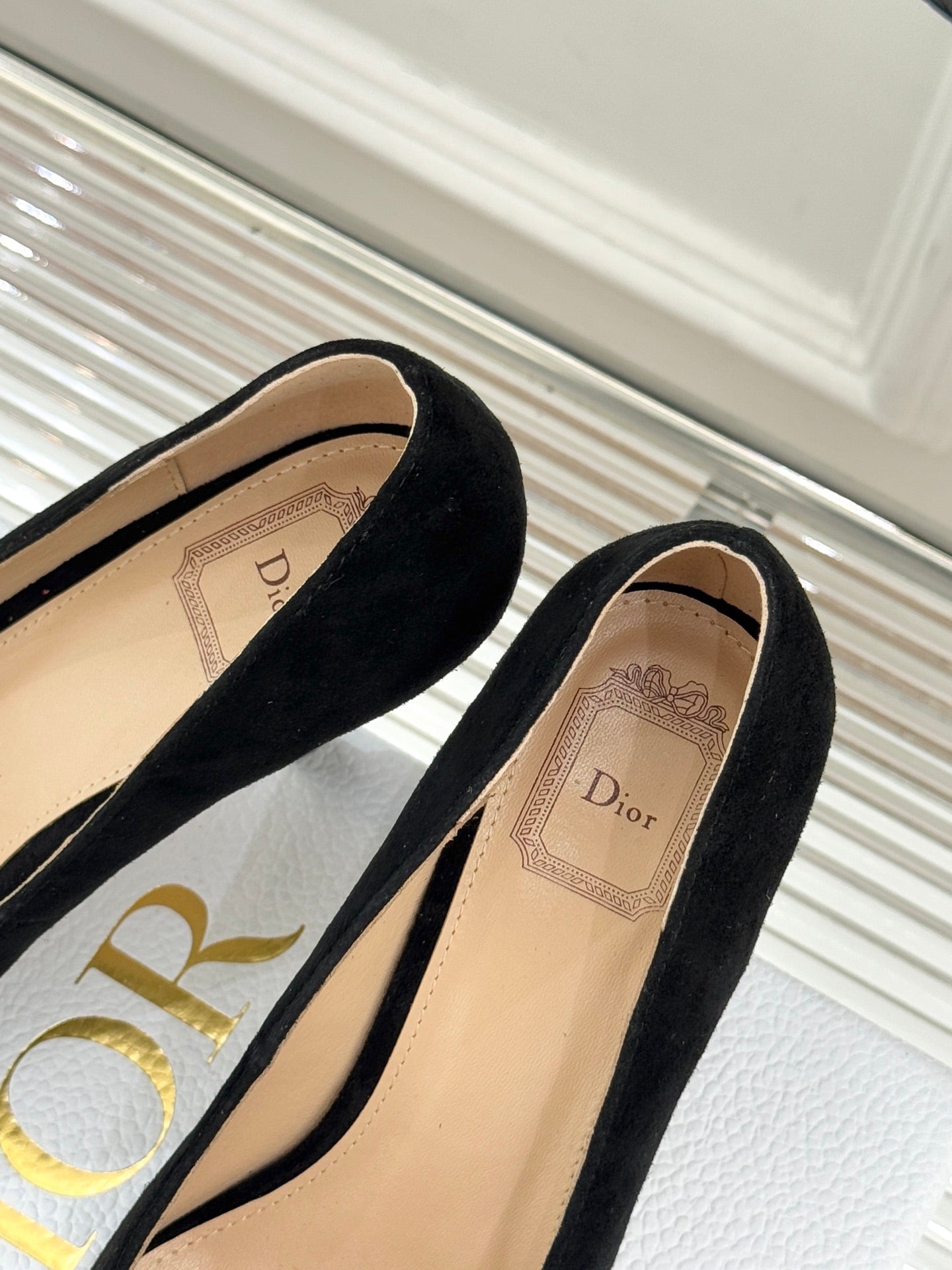 Black suede pointed pumps with Dior logo on insole