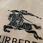 Beige fabric panel with black horse illustration and Burberry branding