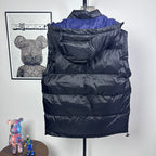 Moncler long puffer jacket back view, dark quilted puffer, hood, blue shoulder lining