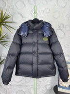 Moncler hooded puffer jacket with blue yoke and front pockets