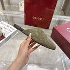 Gucci unisex loafer side view with GG monogram, olive fabric and gold horsebit