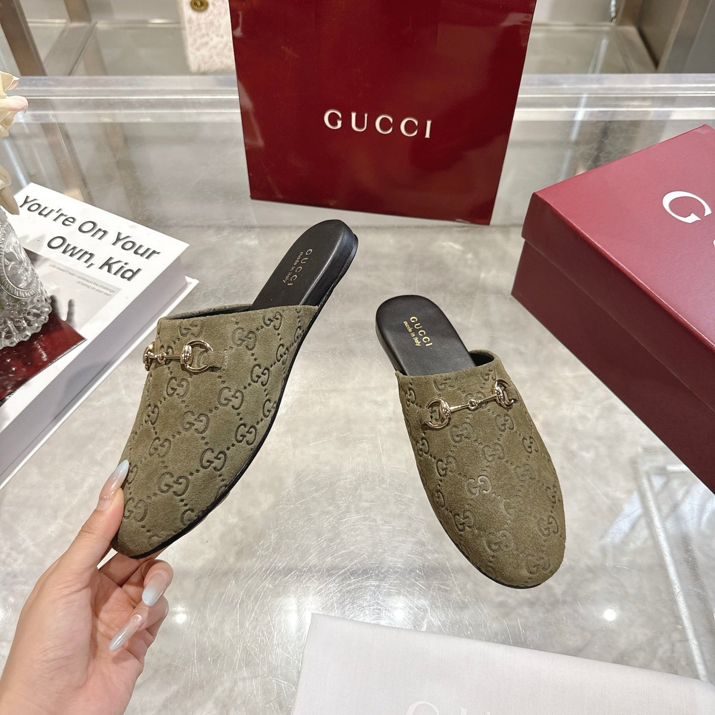Gucci unisex loafer with GG monogram, olive fabric and gold horsebit; black sole