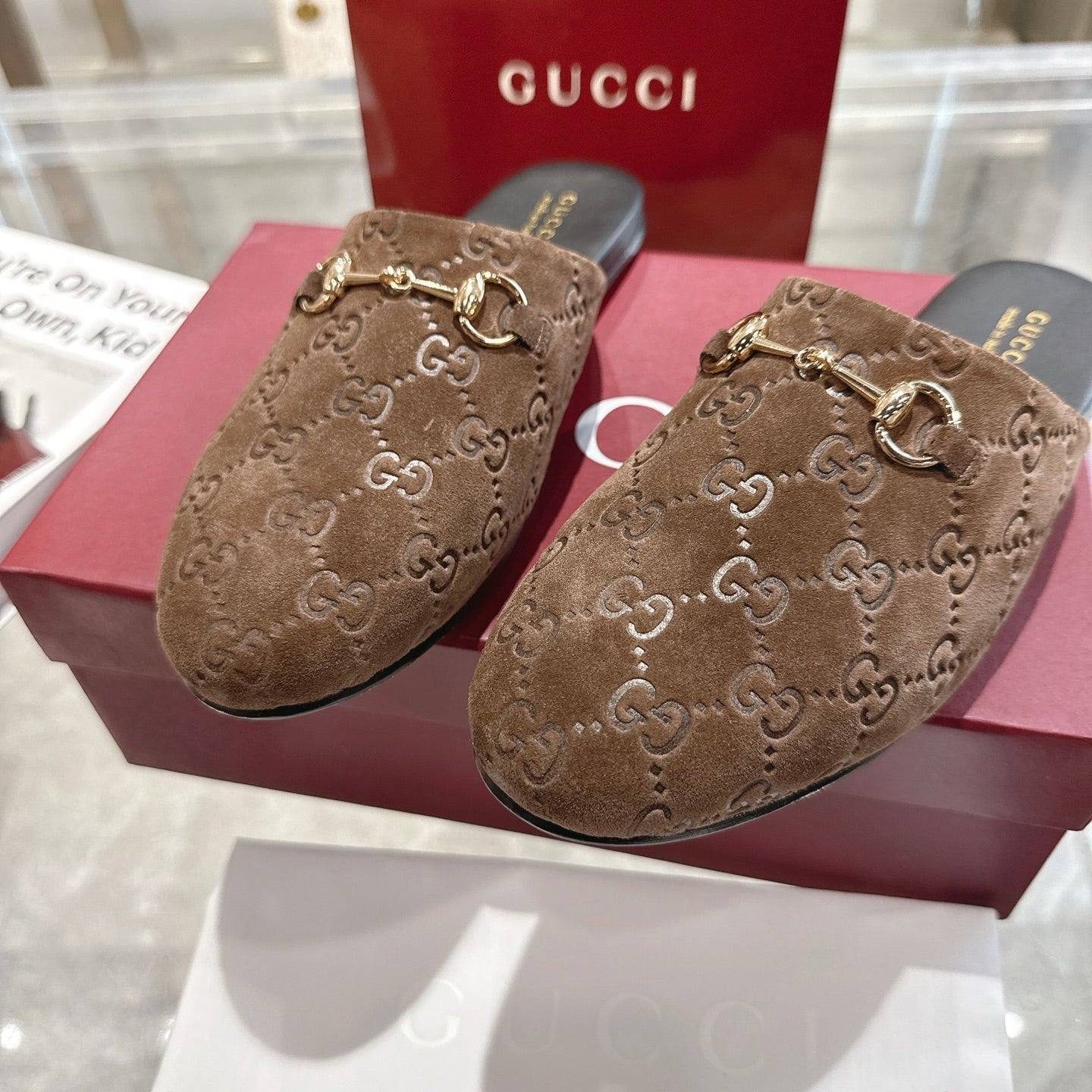 Gucci unisex mules with GG monogram fabric and metal horsebit ornament, brown