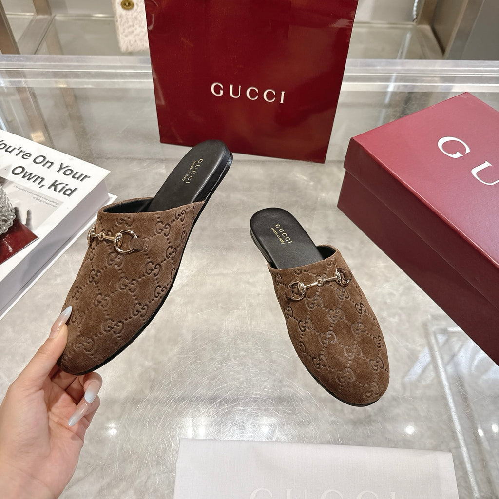 Gucci unisex mules with GG monogram fabric and gold-tone horsebit detail, dark brown