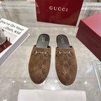 Gucci unisex mules with GG monogram upper and metal horsebit detail, dark brown