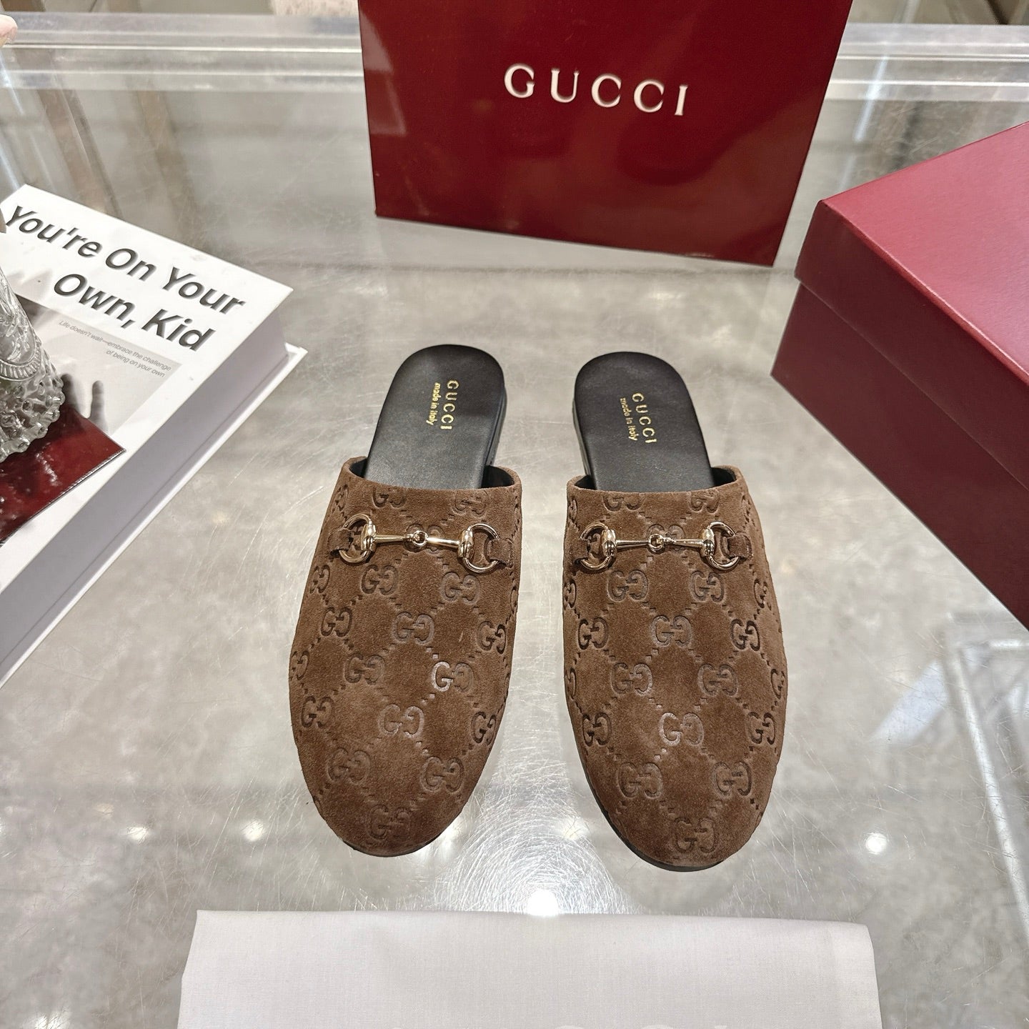 Gucci unisex mules with GG monogram upper and metal horsebit detail, dark brown
