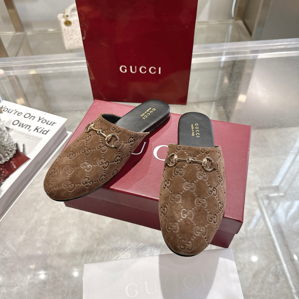 Gucci unisex mules with GG monogram upper and gold-tone horsebit detail, brown