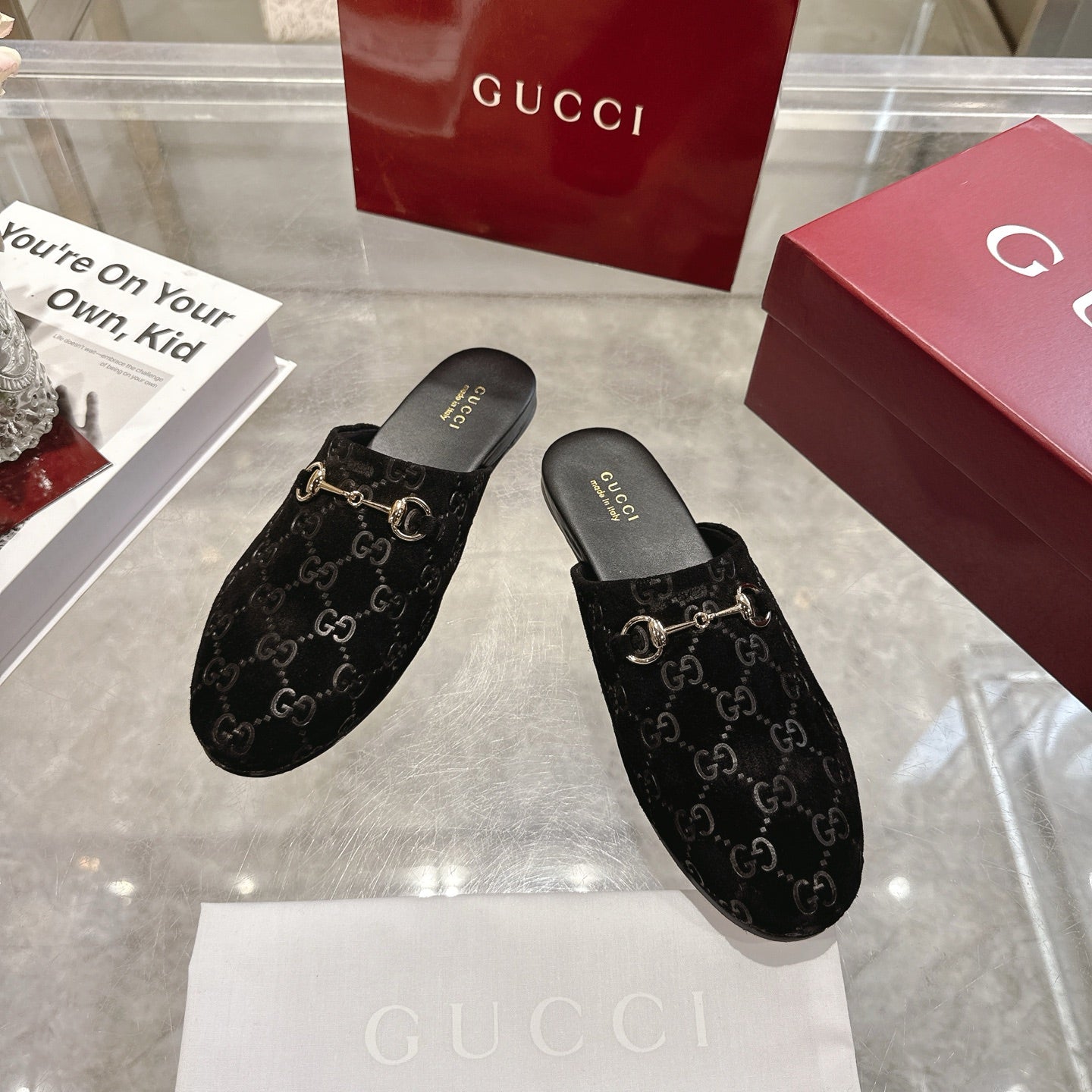 Gucci unisex GG-print mule slides, black with gold horsebit straps, padded footbed