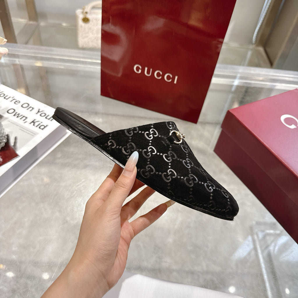 Gucci unisex mule slide, black GG fabric with gold-tone horsebit strap, slip-on