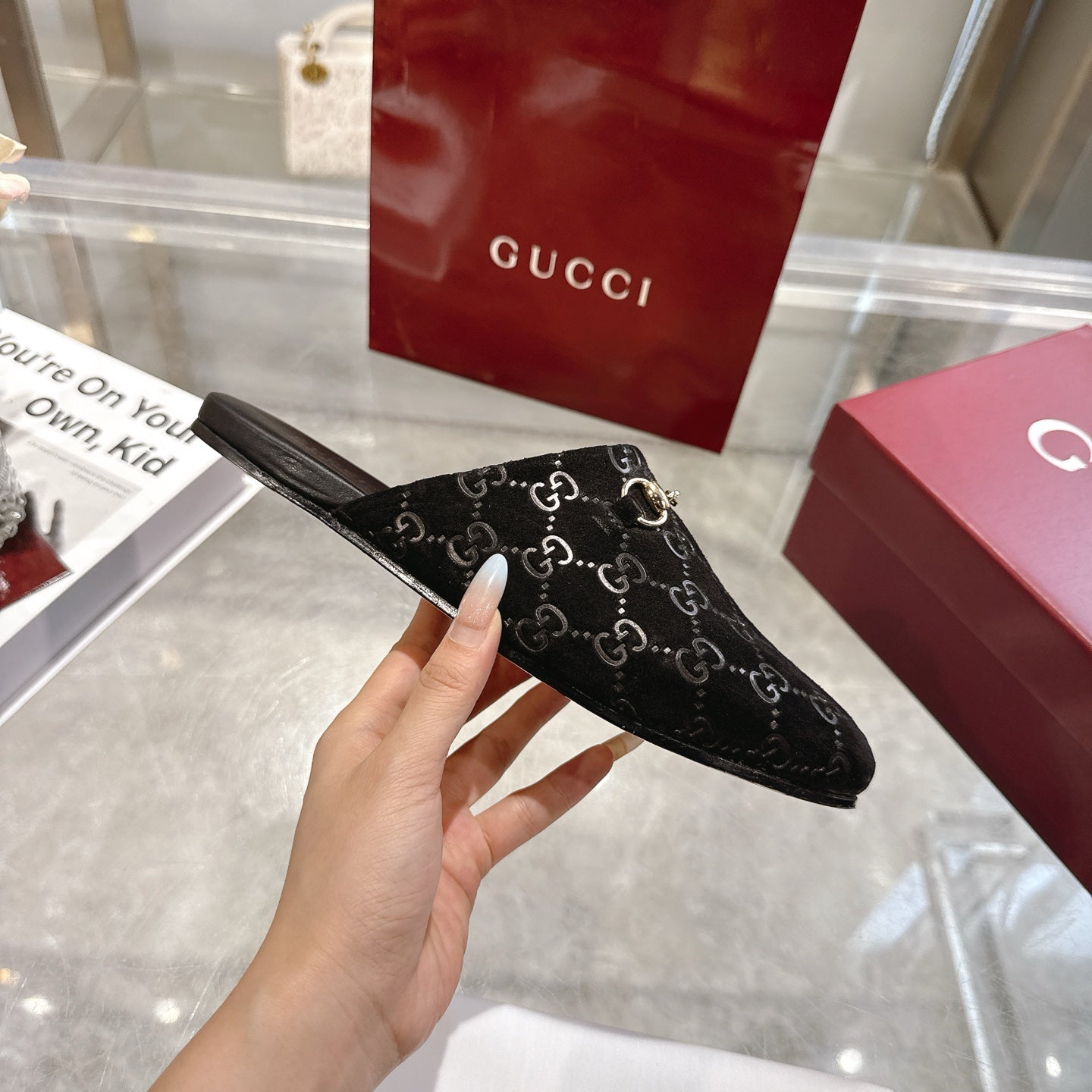 Gucci unisex mule slide, black GG fabric with gold-tone horsebit strap, slip-on