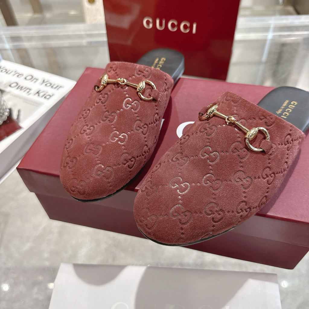 Gucci unisex luxury shoes, red-brown GG embossed mule top view with gold horsebit