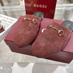 Gucci unisex luxury shoes, red-brown GG embossed mule top view with gold horsebit