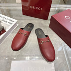 Gucci unisex loafers in burgundy leather with gold horsebit, black slip-on mules