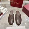 Gucci unisex leather loafers with gold-toned horsebit hardware, rounded toe, slip-on.