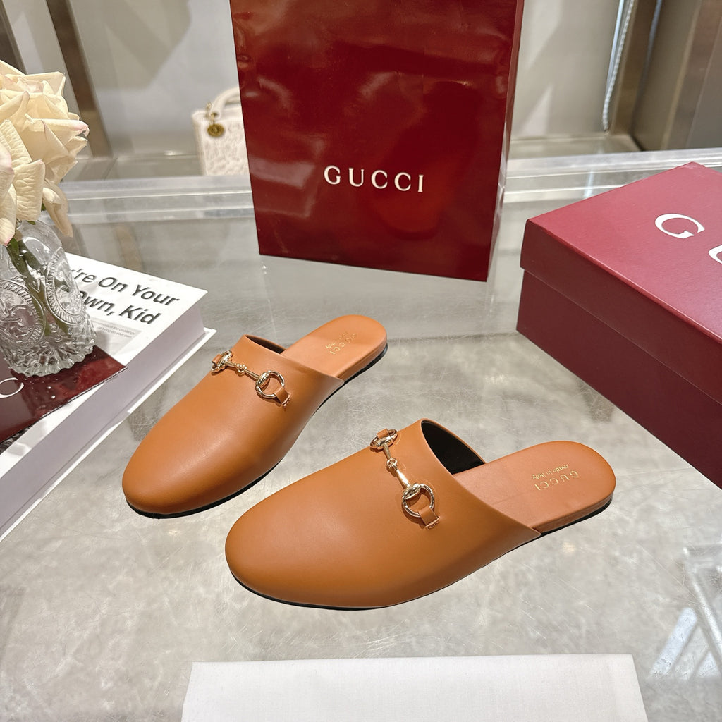Gucci tan leather mule sandals with gold-tone horsebit on vamp