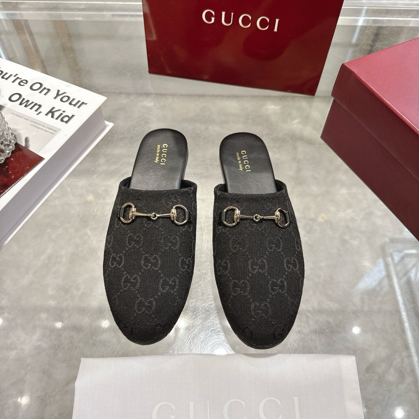 Gucci unisex loafers in dark monogram fabric with gold horsebit on black slip-on mules