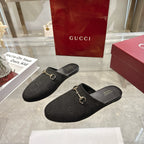 Gucci unisex loafers, dark monogram slip-on mules with gold horsebit hardware