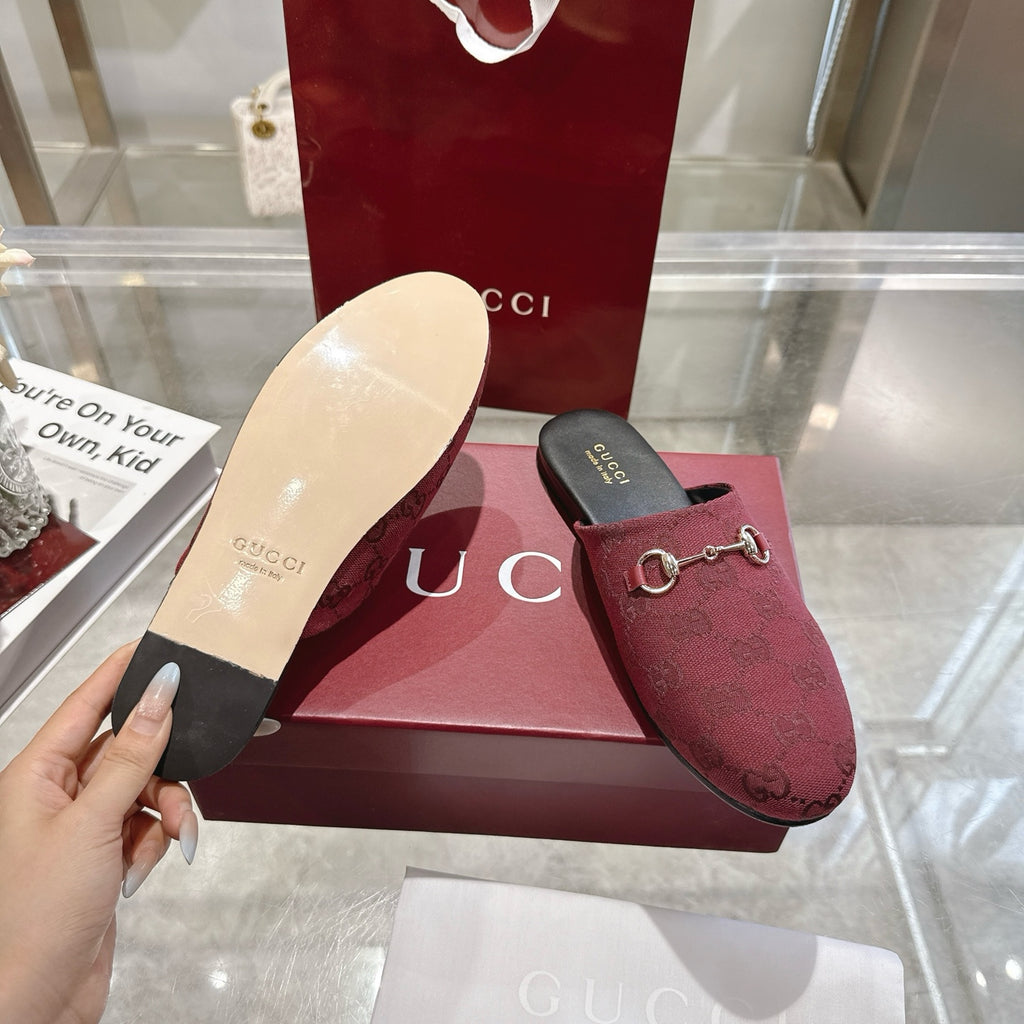 Gucci unisex horsebit mule slides in burgundy GG fabric, gold-tone bit, open view