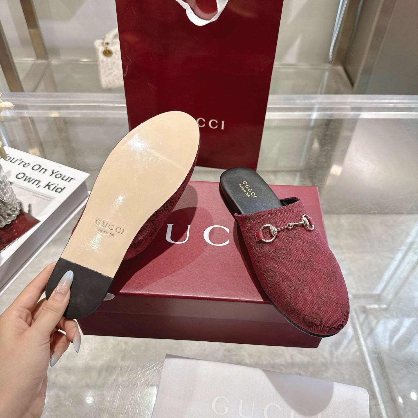 Gucci unisex horsebit mule slides in burgundy GG fabric, gold-tone bit, open view