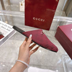 Gucci unisex horsebit slide mule in burgundy GG fabric, shown from outer side