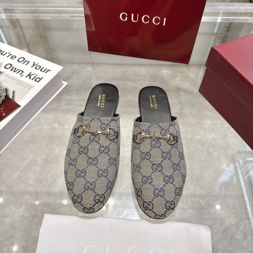 Gucci unisex GG monogram slides with gold-toned horsebit detail, blue canvas