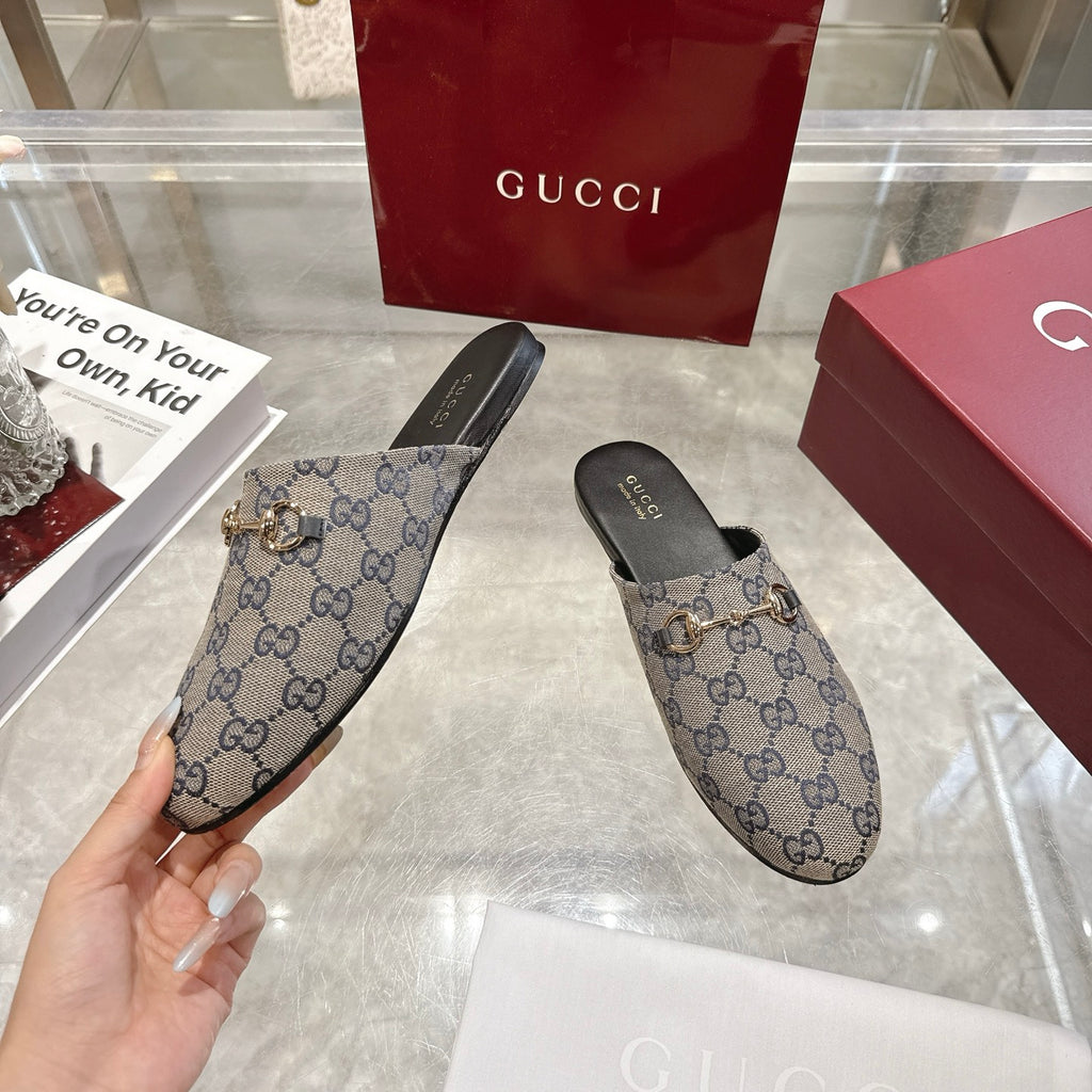 Gucci unisex GG monogram slides pair, blue-toned upper with gold-toned horsebit trim