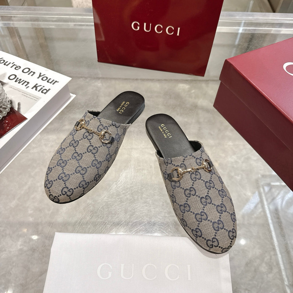 Gucci unisex GG monogram mule slides with gold-toned horsebit on blue-toned upper
