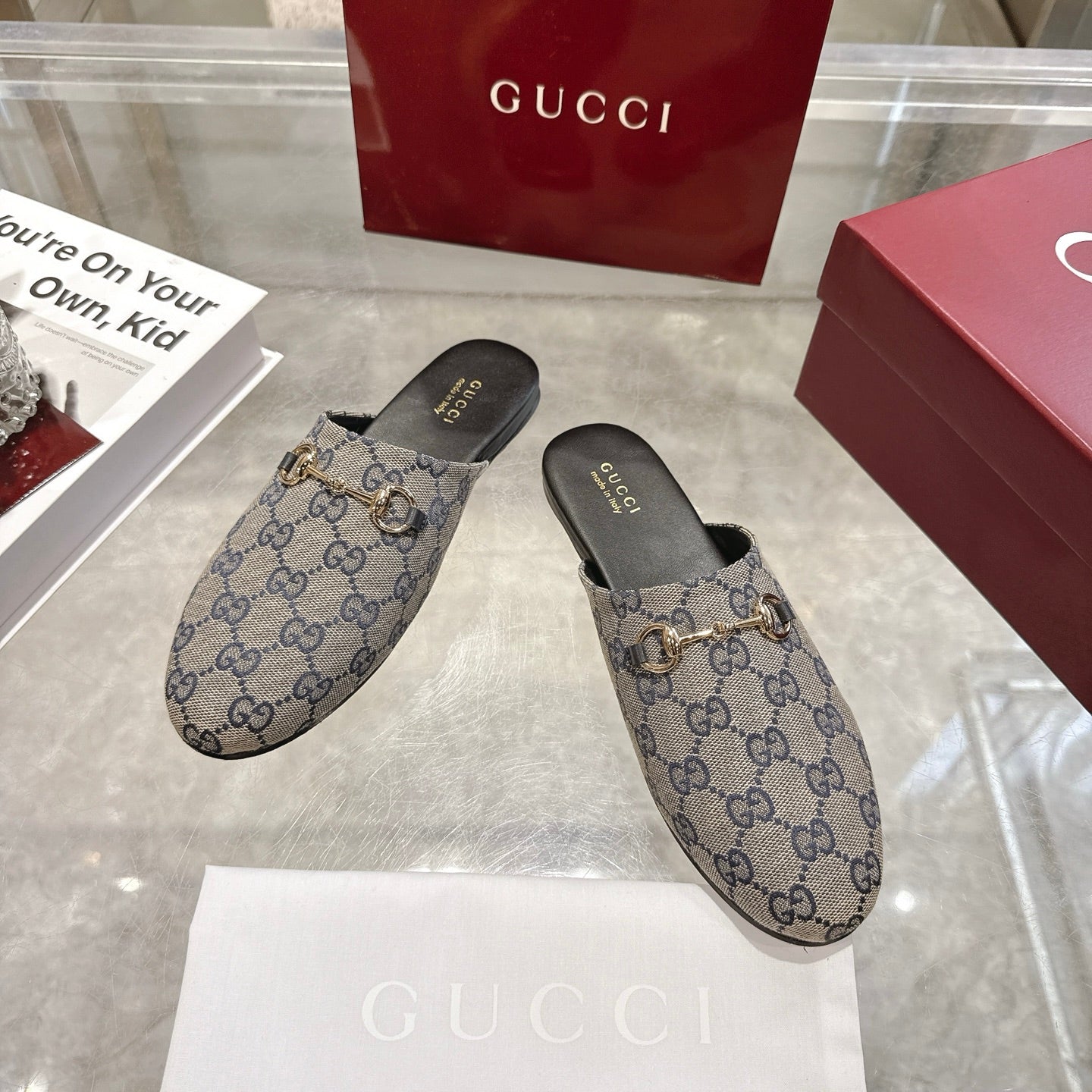 Gucci unisex GG monogram mule slides with gold-toned horsebit on blue-toned upper