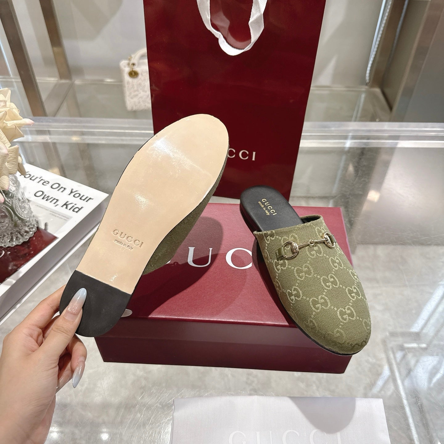 Gucci unisex mule shoe, olive GG canvas; outsole underside view