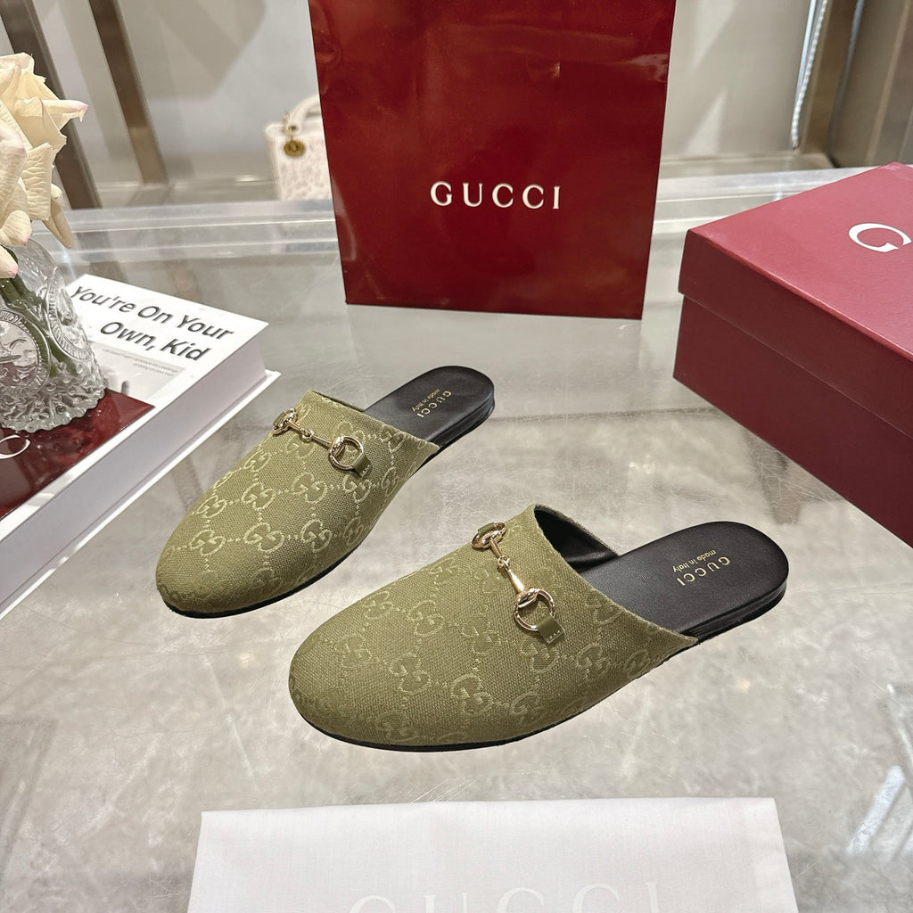 Gucci unisex GG canvas mules, olive pair view with gold-tone horsebit hardware