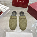 Gucci unisex GG canvas mules, olive with gold-tone horsebit on black slip-on footbed
