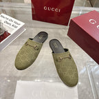Gucci unisex GG canvas mules, olive slip-on with gold-tone horsebit detail