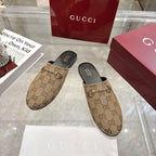 Gucci unisex GG-pattern mules, slip-on style with dark rubber sole