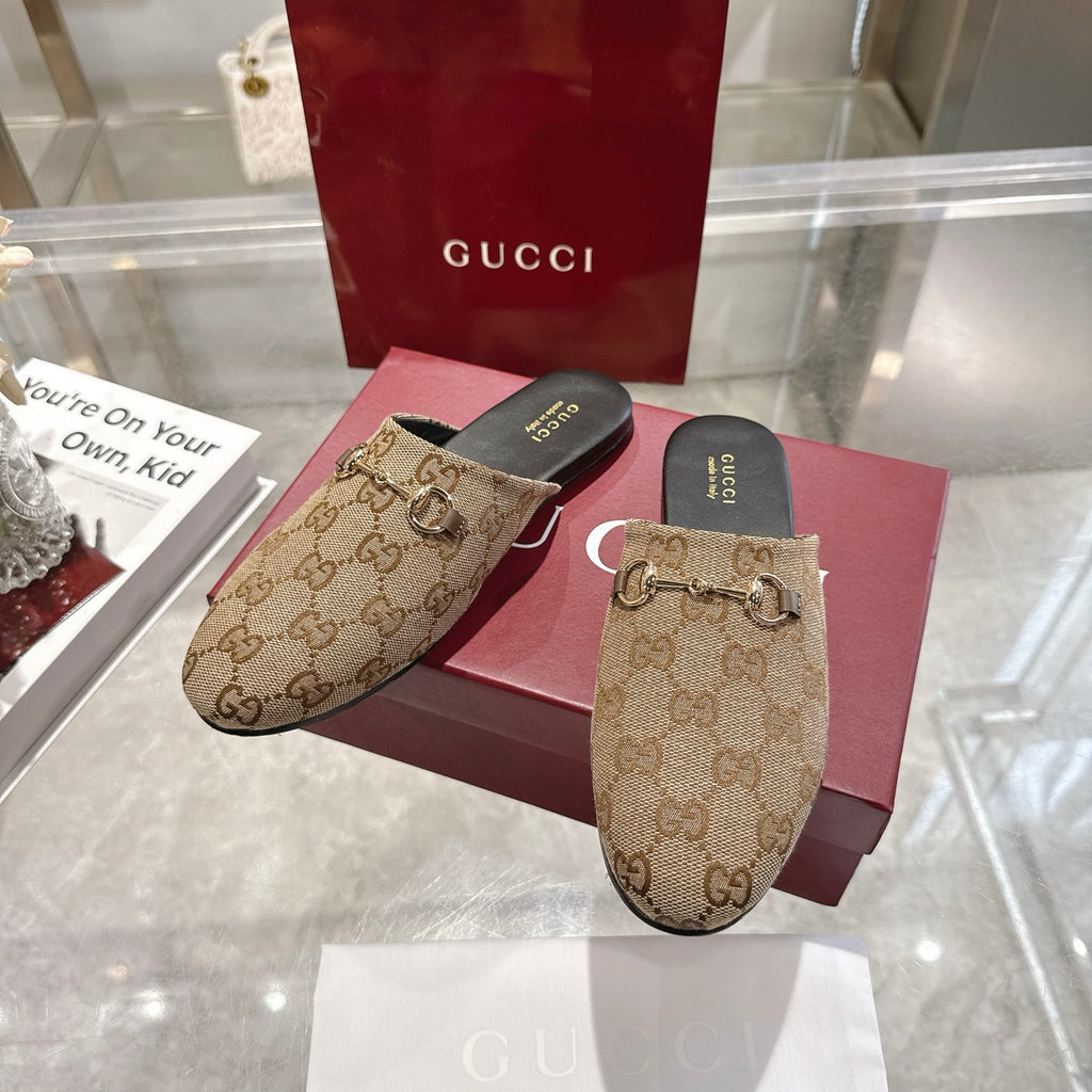 Gucci unisex GG canvas mules pair with horsebit detail, slide style
