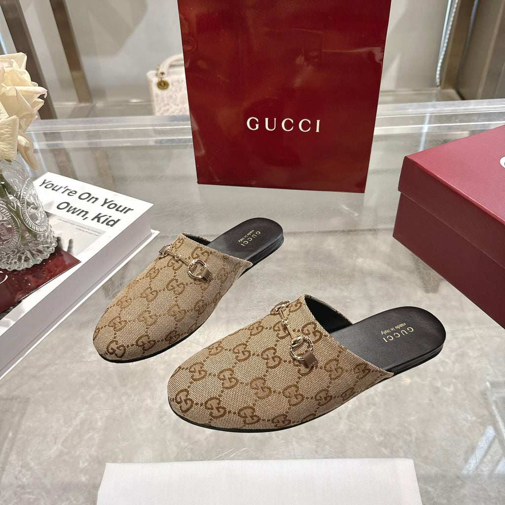 Gucci unisex mule slippers with GG logo canvas and gold-tone horsebit