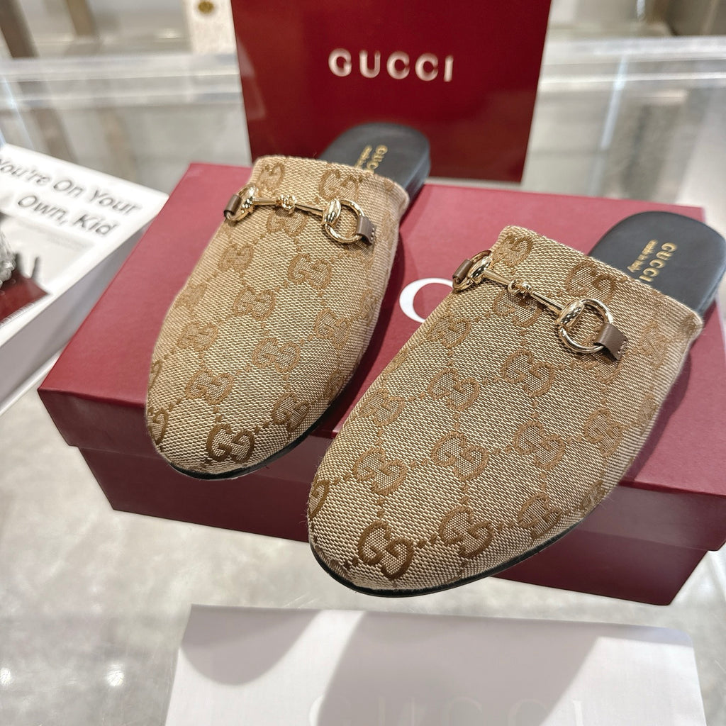 Gucci unisex slide mules with GG monogram canvas and gold horsebit