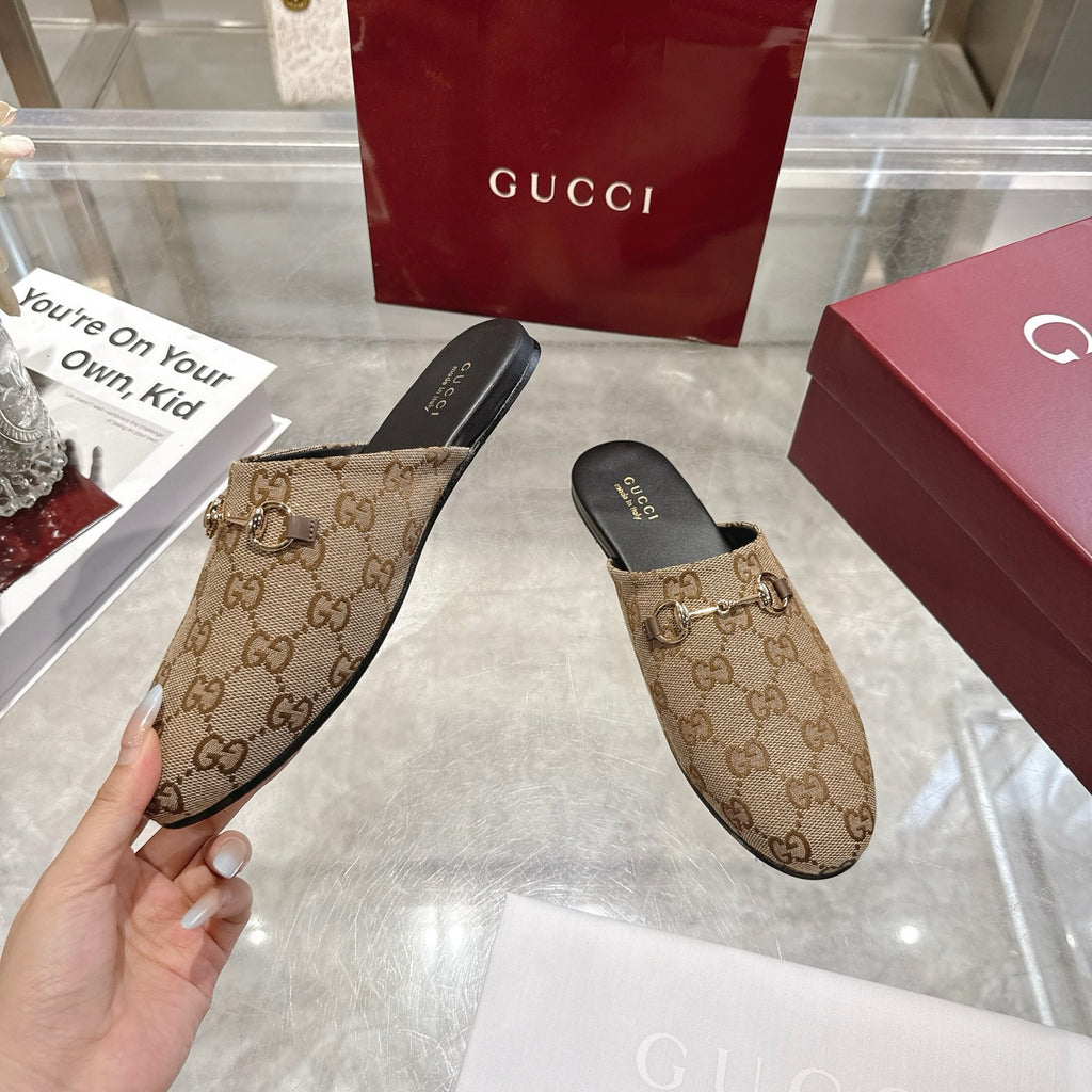 Gucci unisex GG canvas mules with horsebit strap and black footbed