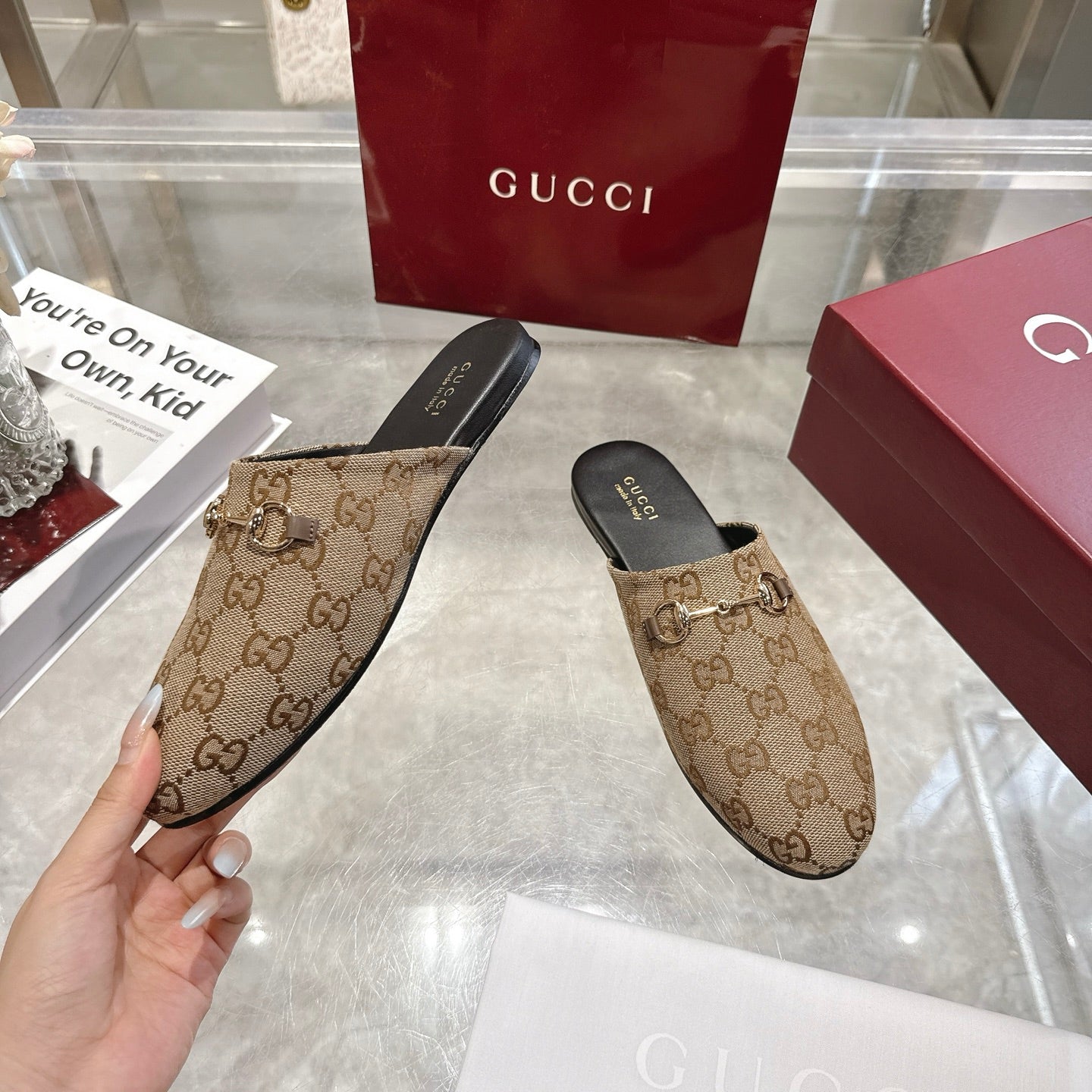 Gucci unisex GG canvas mules with horsebit strap and black footbed