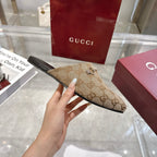Gucci unisex mule with GG monogram canvas upper and dark sole