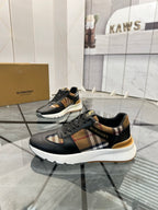 Black lace-up sneakers with plaid-style side panel and white sole edge