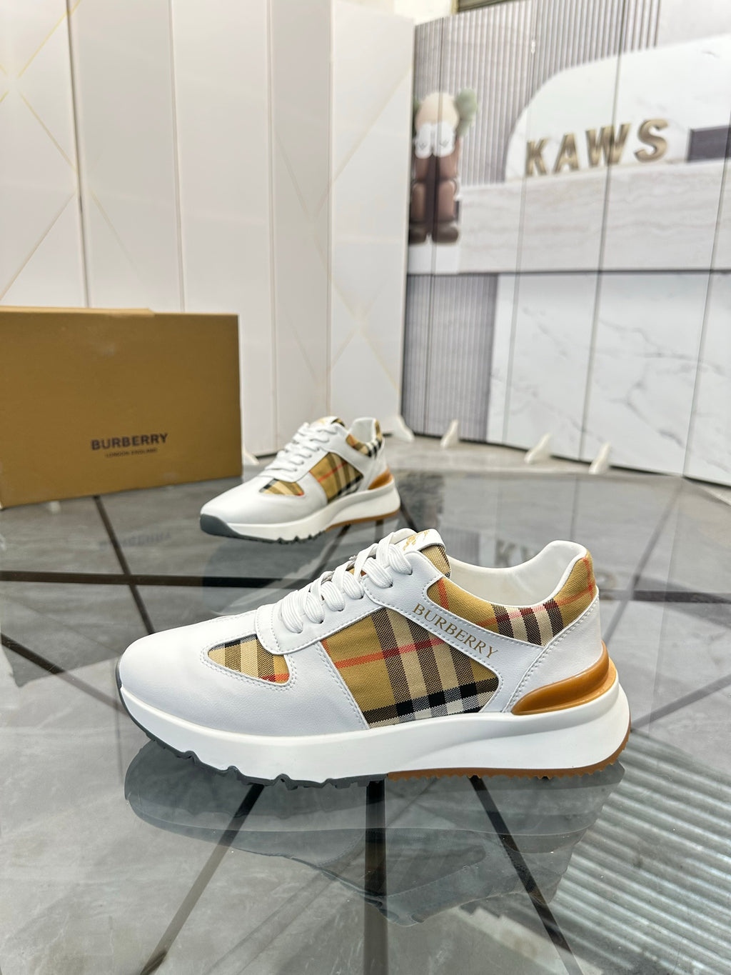 Burberry white lace-up sneaker with plaid side panel and gold-toned heel detail
