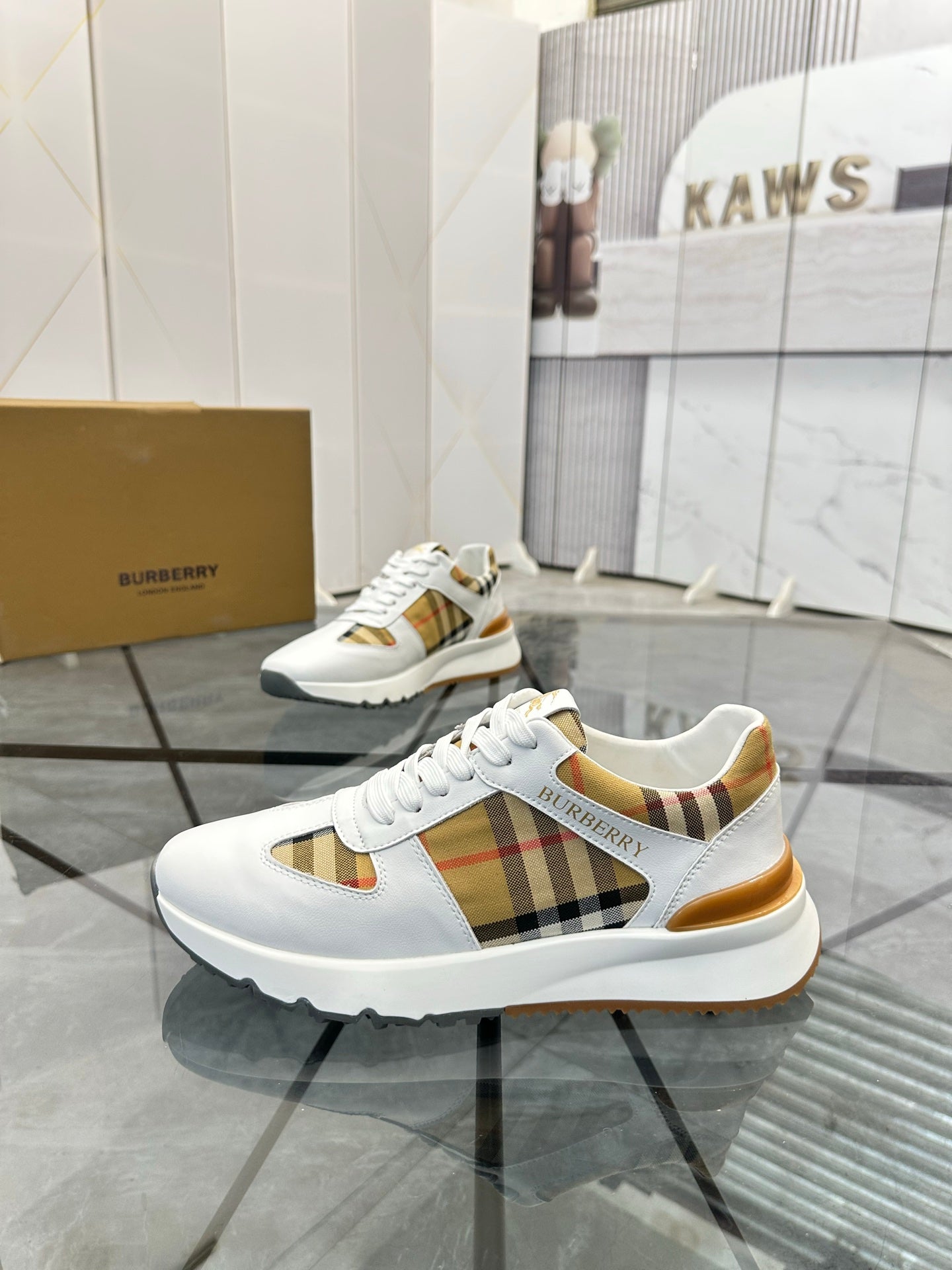 Burberry white lace-up sneaker with plaid side panel and gold-toned heel detail