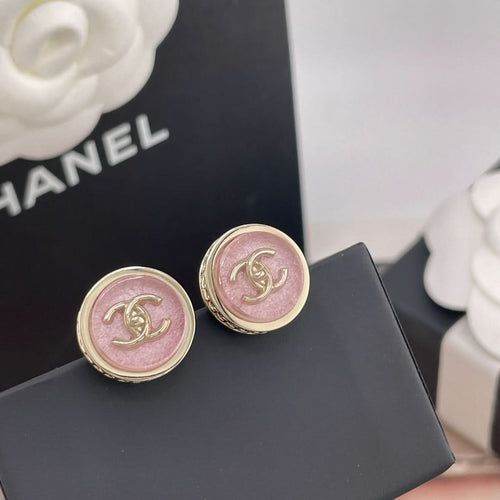 Pair of Chanel round stud earrings with pink CC logo medallions and gold trim