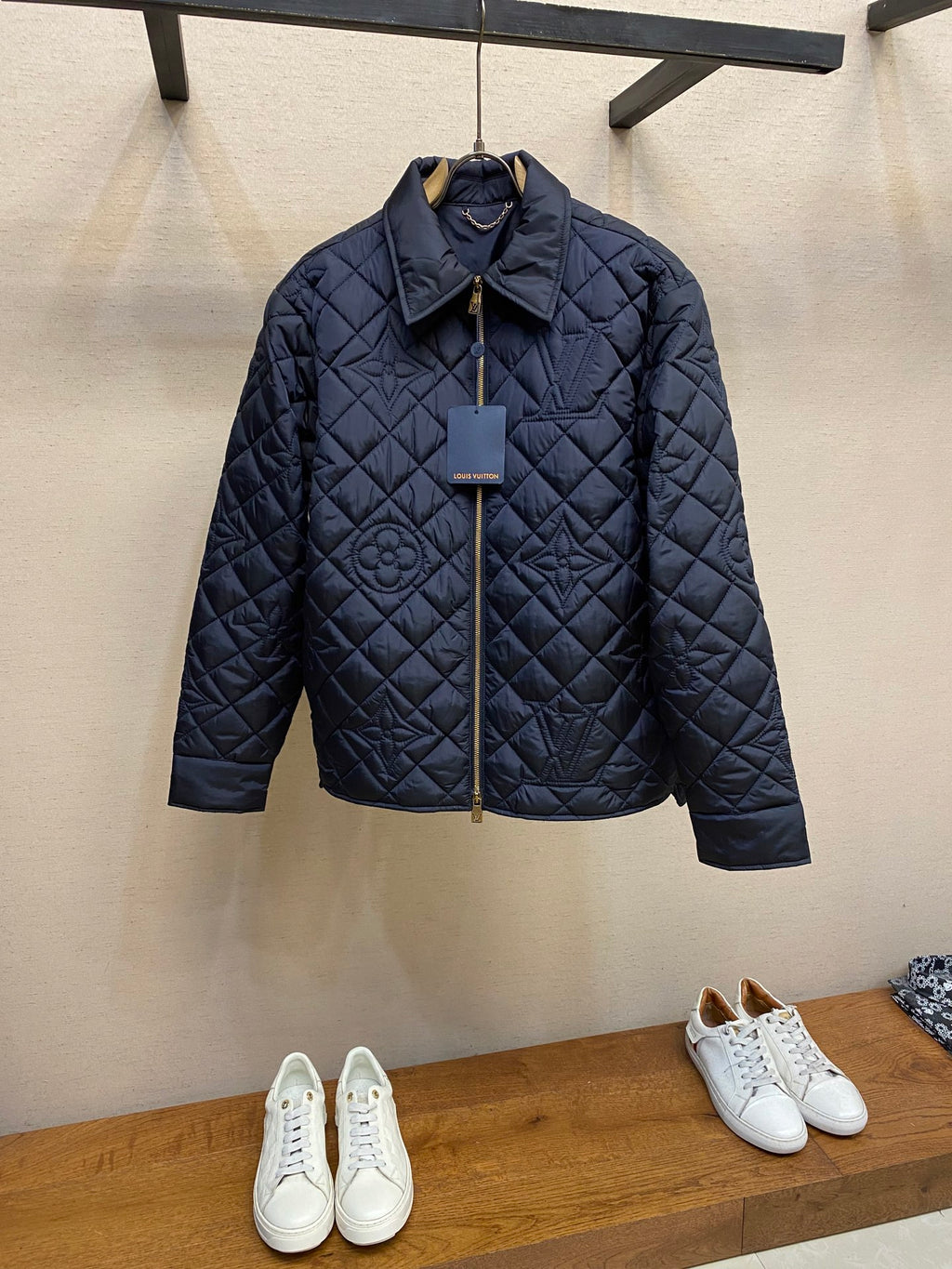 Louis Vuitton quilted long jacket in dark navy, full-zip front and stand collar