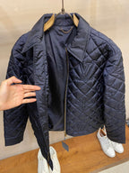 Louis Vuitton quilted long jacket on hanger, open front and padded collar